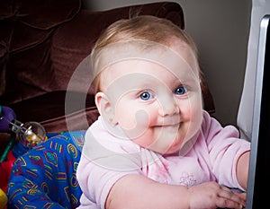 Blue-eyed Baby at computer screen