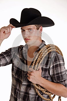 Blue-Eyed Cowboy Tips His Hat