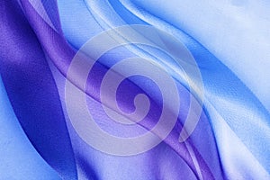 Blue fabric folds, abstract textile background