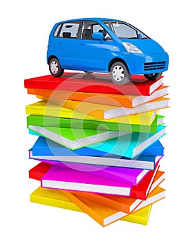 Blue family car on a stack of colorful books