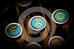 Blue faq typewriter keys