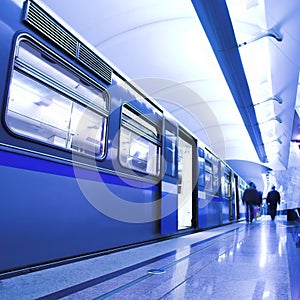 Blue fast train stay at platform