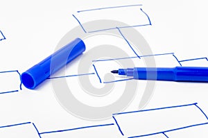 Blue Felt Tip Pen on a Sheet of Paper
