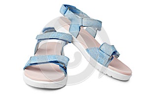 Blue female leather sandals, velcro straps, flat sole white background isolated closeup front side view, pair women summer shoes