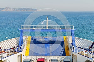 Blue ferry boat for transport of people and cars