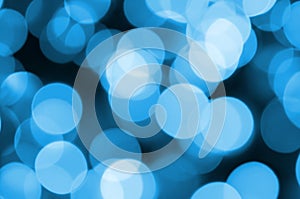 Blue Festive Christmas elegant abstract background with many bokeh lights. Defocused artistic image