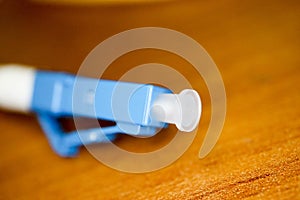 blue fiber optic cable connector LC closeup