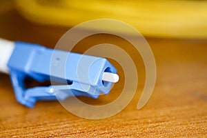 Blue fiber optic cable connector LC closeup