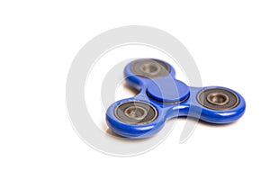 Blue fidget spinner in white background
