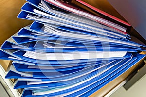 Blue file folder documents In a file cabinet retention