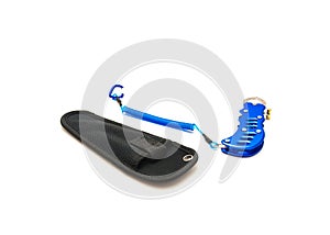 Blue fish lip gripper with stainless-steel jaws and black carry bag isolated on white