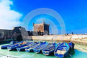 Blue fisher rowing boats in the port of Essaouira - Morocco