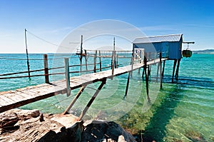 Blue fishermen hut in Tuscany beach