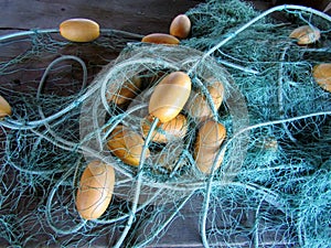 Blue fishing net and floats close up