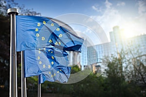 On the blue flag the symbol bitcoin. Regulation of the crypto currency by the European Union