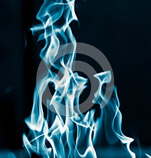 Blue flame fire on a black background