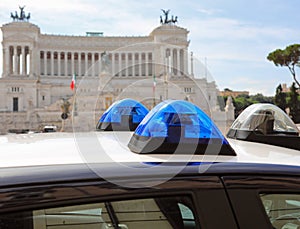 blue flashing lights of the Italian police car in Rome and in th