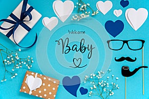 Blue Flat Lay With Accessories, Gifts, Hearts, Text Welcome Baby