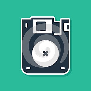 Blue Floppy disk for computer data storage icon isolated on green background. Diskette sign. Vector