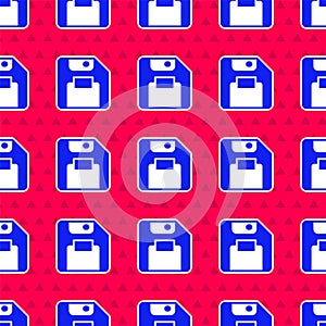 Blue Floppy disk for computer data storage icon isolated seamless pattern on red background. Diskette sign. Vector