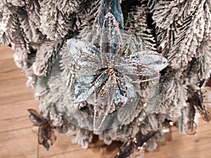 Blue floral decoration on Christmas tree