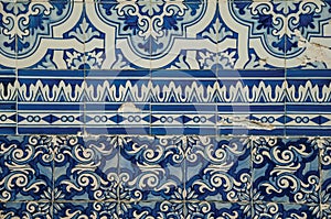 Blue floral pattern hand-painted in baroque style on ceramic tiles