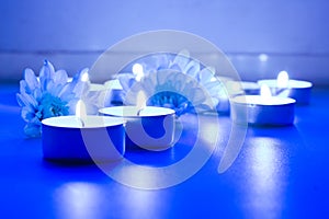 Blue flower and tea candles