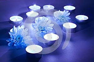 Blue flower and tea candles