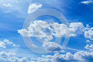 Blue, fluffy clouds in the sky. Background of nature, stratosphere.