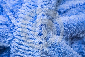 Textured blue fabric macro background closeup texture