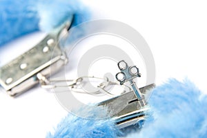 Blue fluffy handcuffs