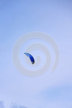 Blue flying kite in the sky