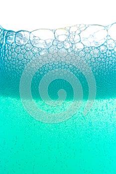 Blue foam bubbles liquid background