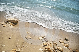 Blue foam waves on sea beach