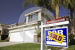 Blue Foreclosure For Sale Real Estate Sign and Hou photo