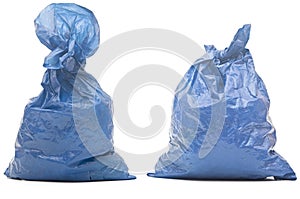 Blue garbage bag with trash