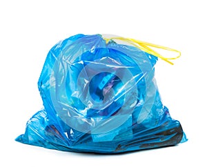 Blue garbage bag with trash