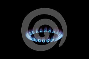 Blue gas flame on a black background