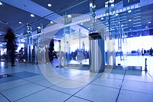 Blue gates in airport terminal