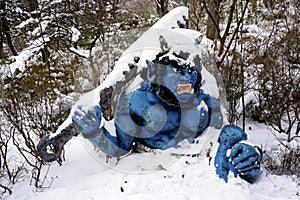 Blue giant myth sculpture at Noboribetsu onsen snow winter