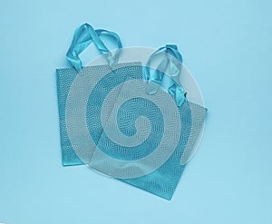 Blue gift bags on a blue background