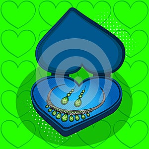 On blue gift box in the shape of heart pop art retro vector. Imitation of the style of comics. Jewelry Set Green