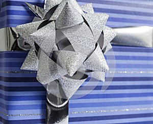 Blue gift box with silver ribbon