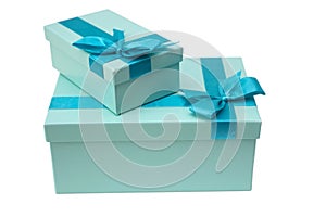 Blue gift boxes with a bow on a white background