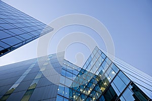 Blue glass buildings on blue sky