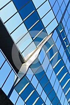 Blue glass surface of a modern office building