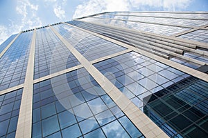 Blue glass wall of skyscraper