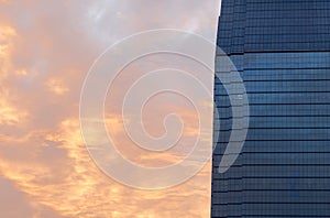 Blue Glass windows Office Building with Morning sky