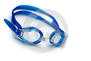 Blue glasses for swim on white background