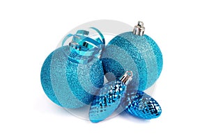 Blue glitter Christmas balls and cones, isolated